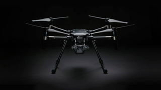 DJI and Taser Maker Axon Are Teaming Up to Make Cop Drones<em></em>